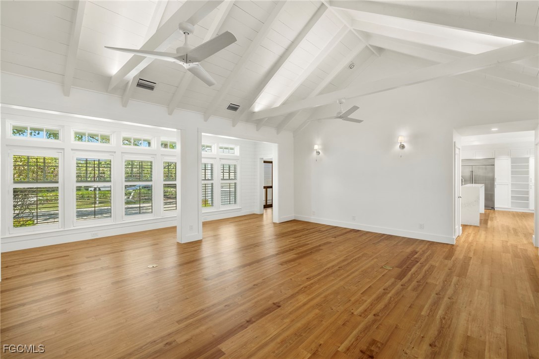 1517 Sand Castle Road Sanibel, FL 33957 - Photo 10 of 50 a view of an empty room with wooden floor and a window