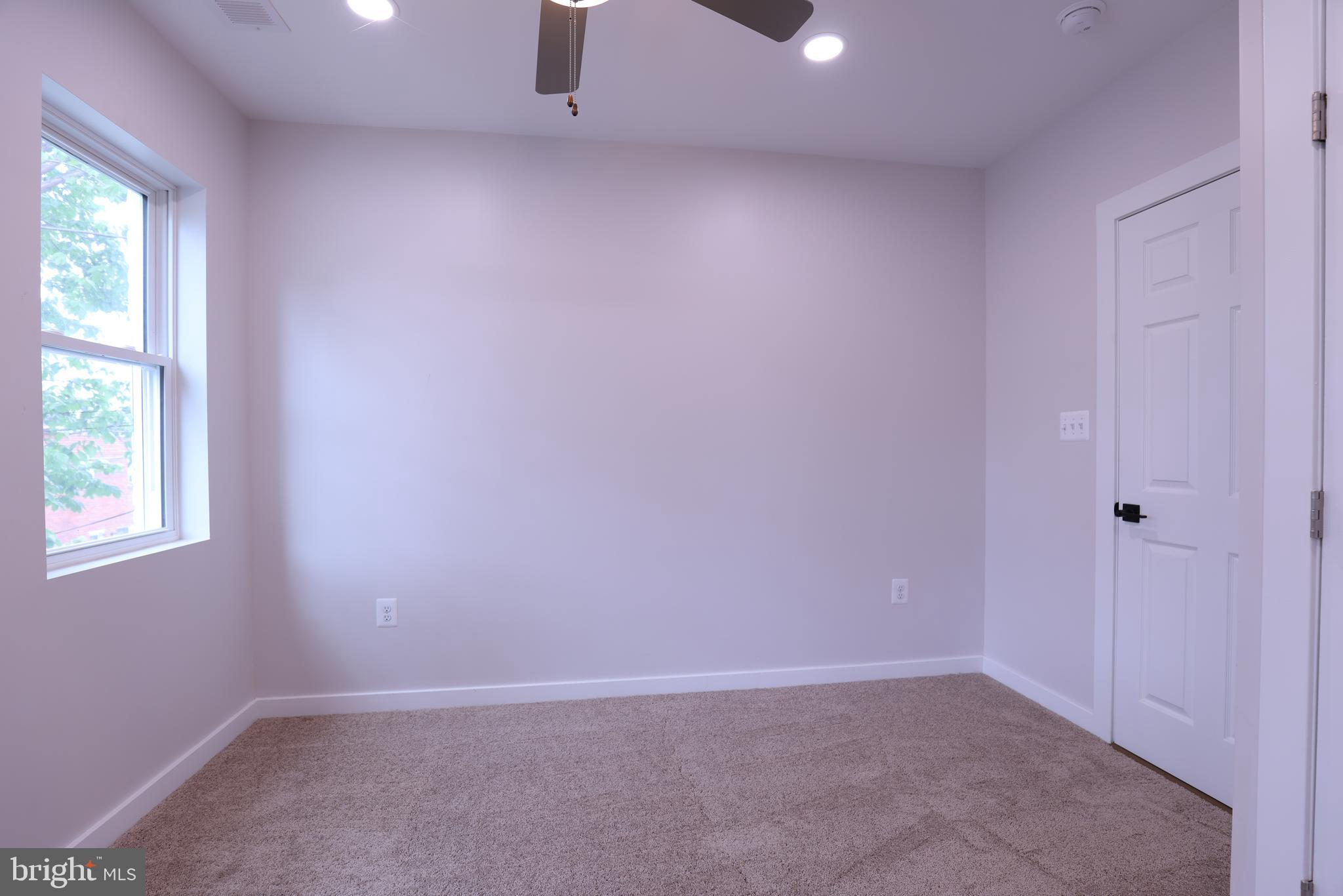 2039 Rosedale Street Northeast Washington, DC 20002 - Photo 14 of 18 an empty room with a window