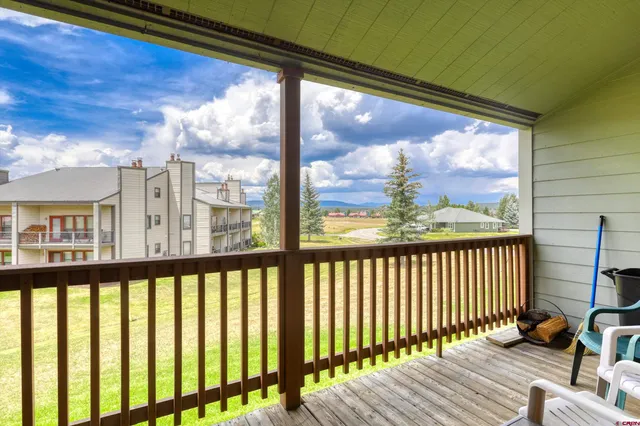 a view of a large window with wooden floor