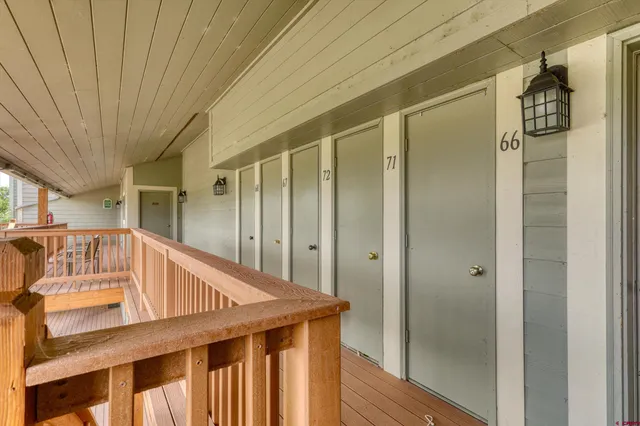 a view of stairs and wooden floor