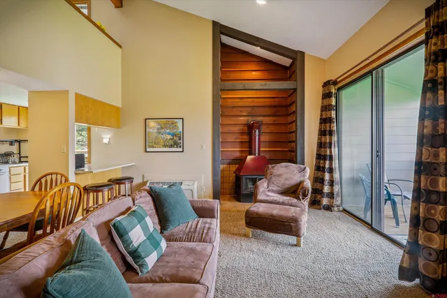 a living room with furniture and a couch