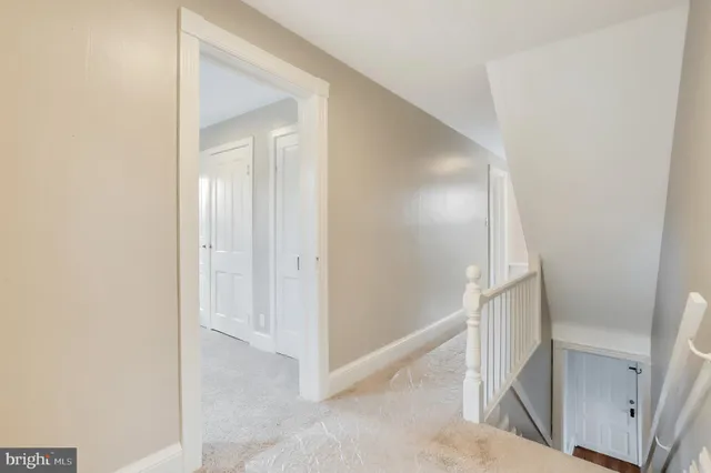 a view of a hallway with entryway