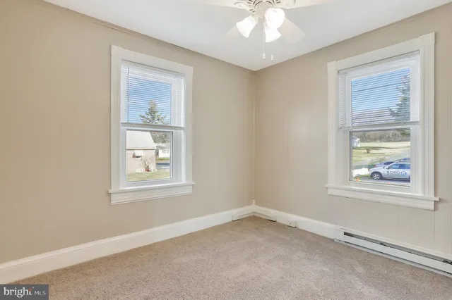 an empty room with a bathroom