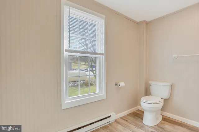 a view of backyard with wooden floor