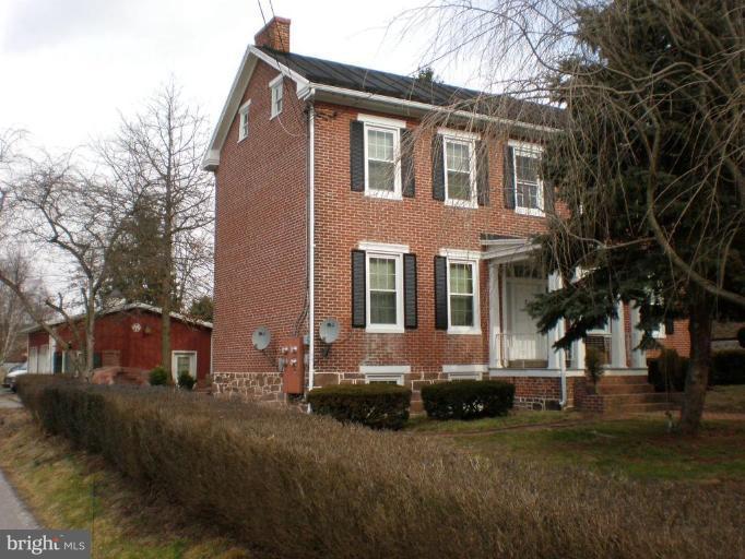 7550 Middleburg Road Keymar, MD 21757 - Photo 1 of 11 a front view of a house with a yard