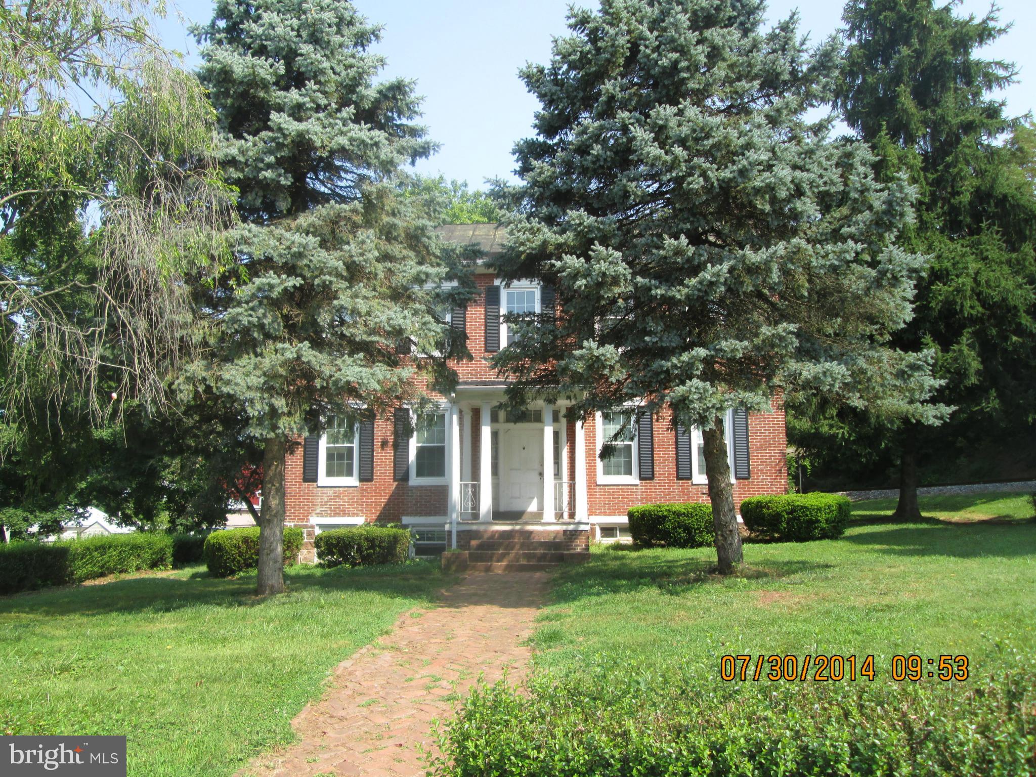 7550 Middleburg Road Keymar, MD 21757 - Photo 2 of 11 a front view of house with yard and green space