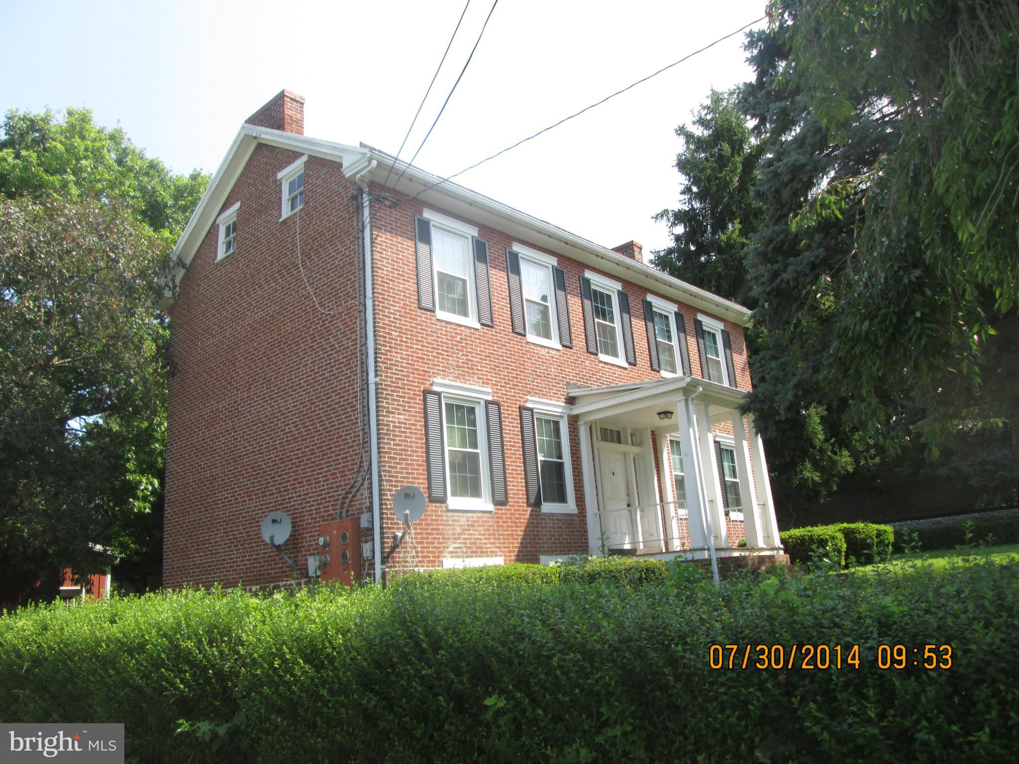 7550 Middleburg Road Keymar, MD 21757 - Photo 3 of 11 a front view of a house with a garden