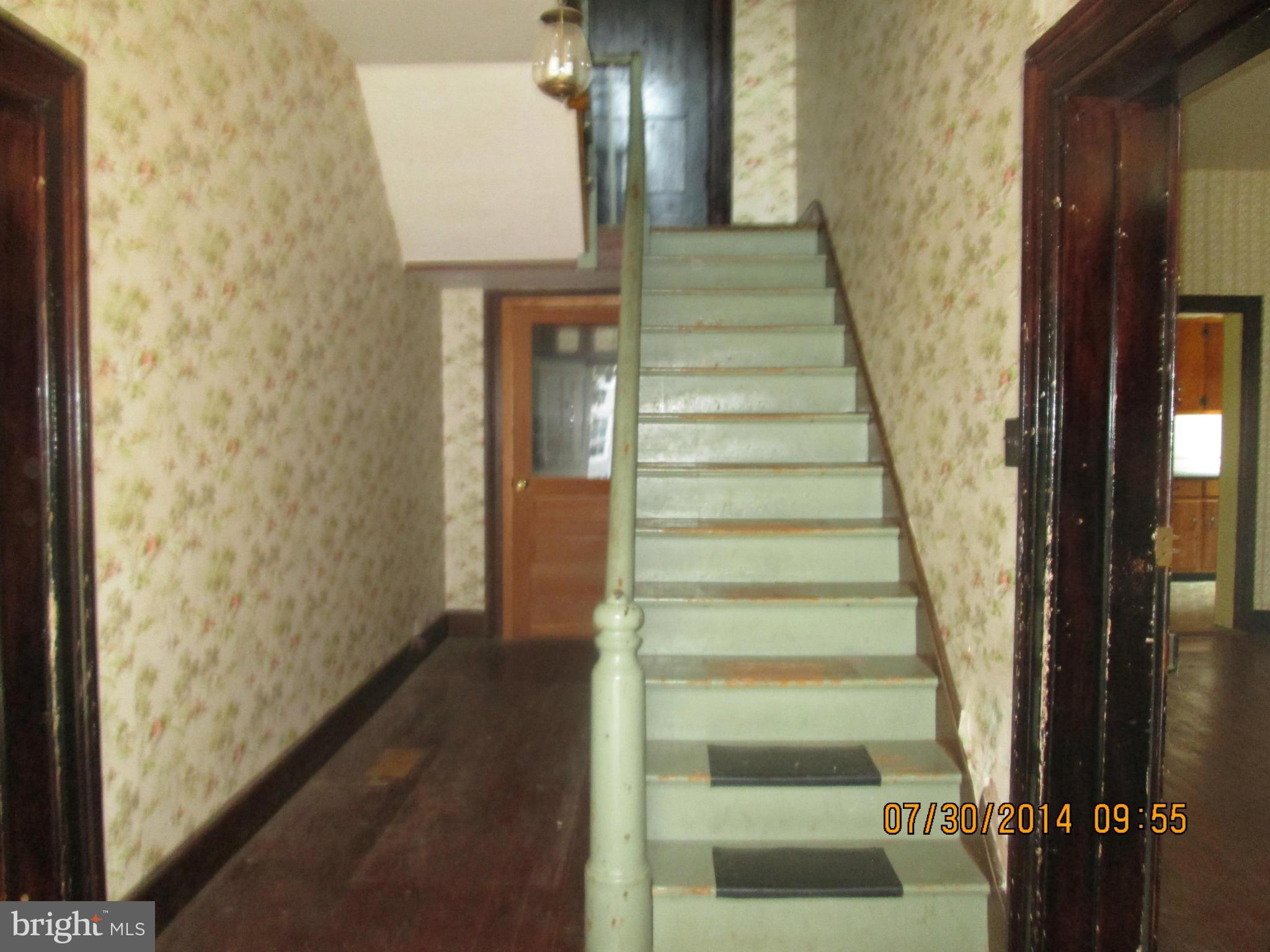 7550 Middleburg Road Keymar, MD 21757 - Photo 9 of 11 a view of a hallway with wooden floor and entryway