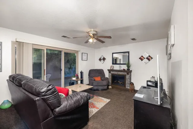 a living room with furniture and a window