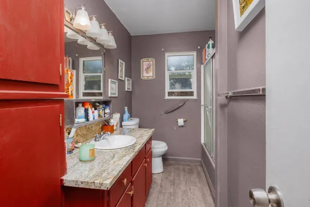 a view of a kitchen area with furniture and a kitchen