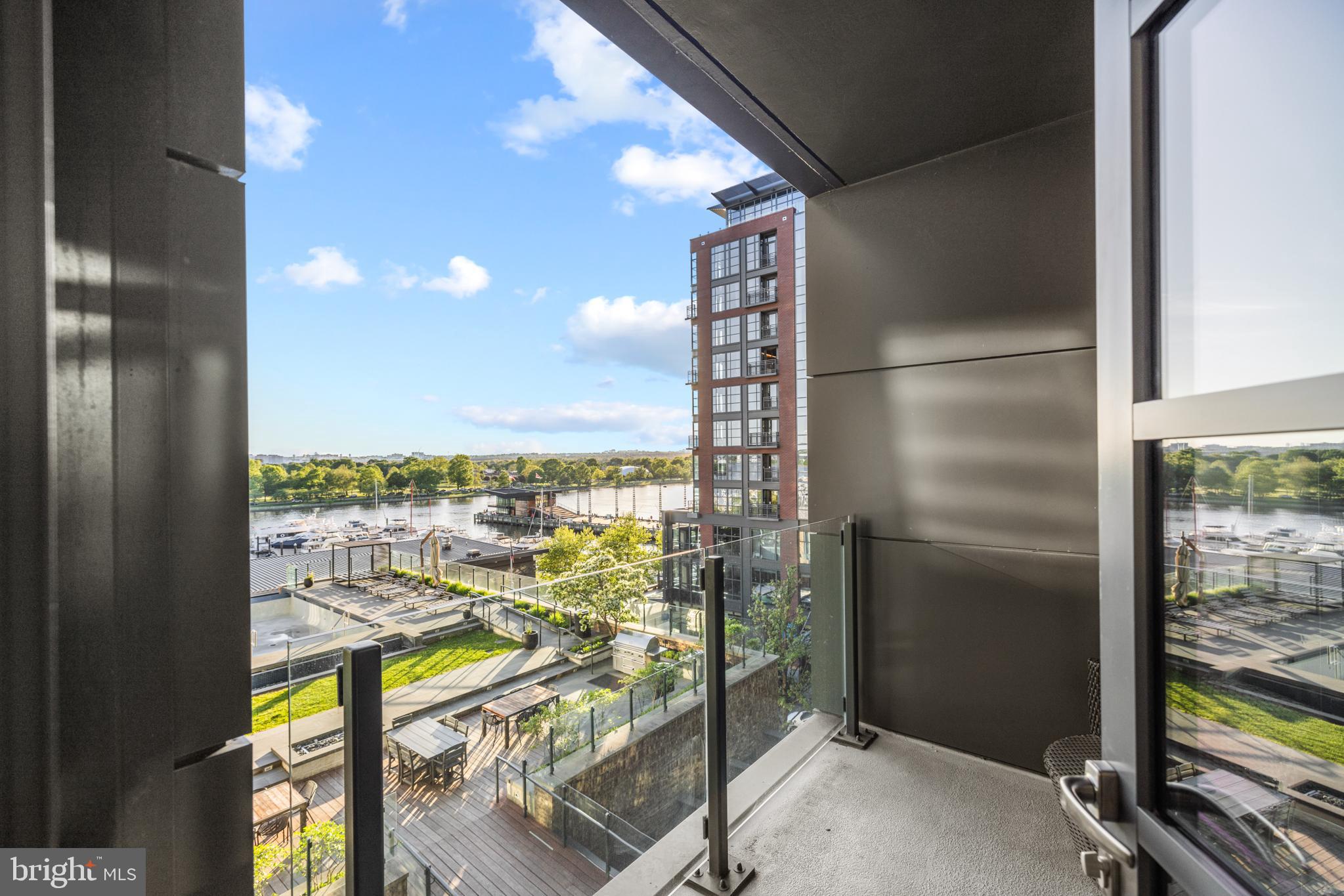 45 Sutton Square Southwest, Unit 503 Washington, DC 20024 - Photo 11 of 50 a view of a balcony with city view