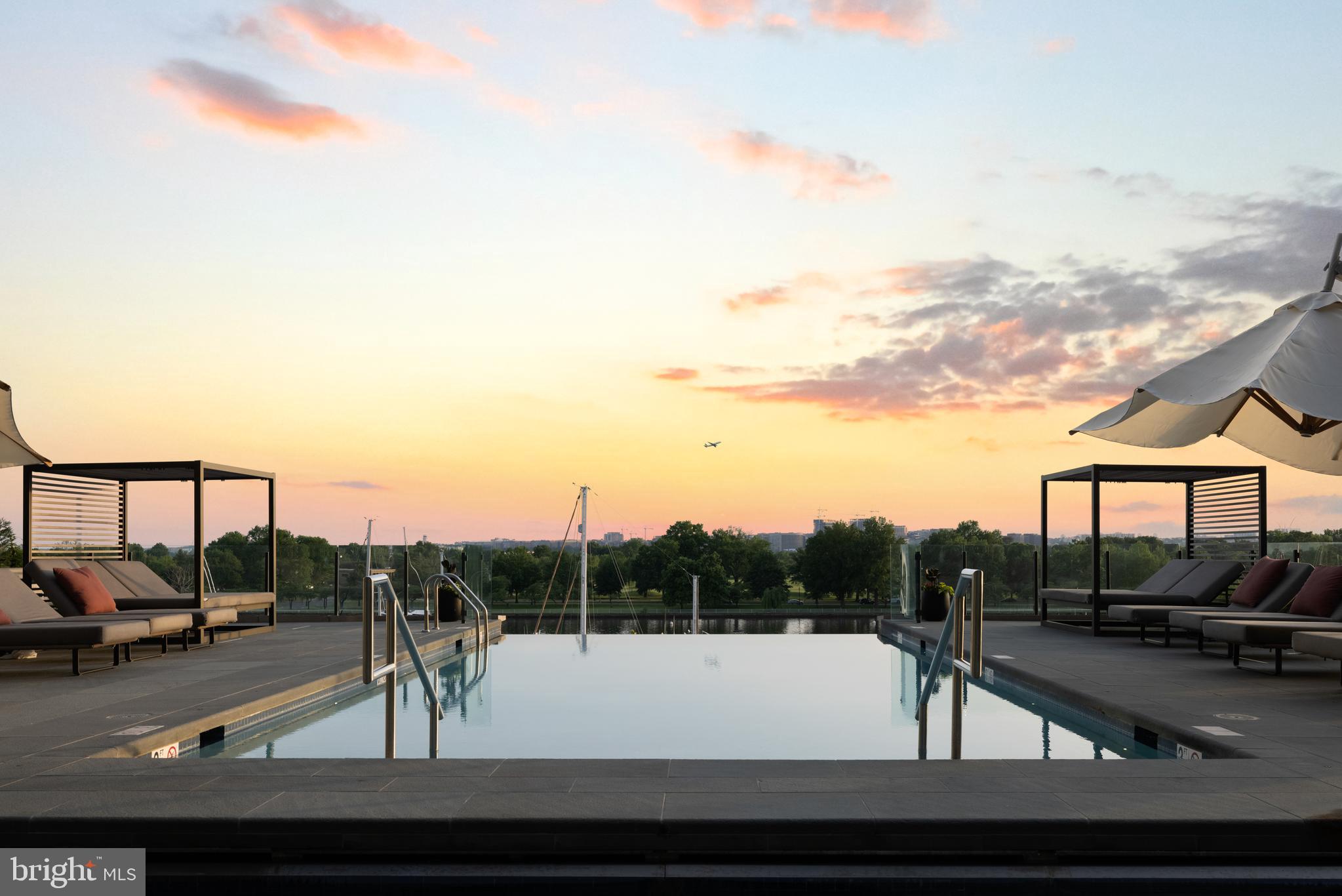 45 Sutton Square Southwest, Unit 503 Washington, DC 20024 - Photo 28 of 50 a view of swimming pool from a balcony
