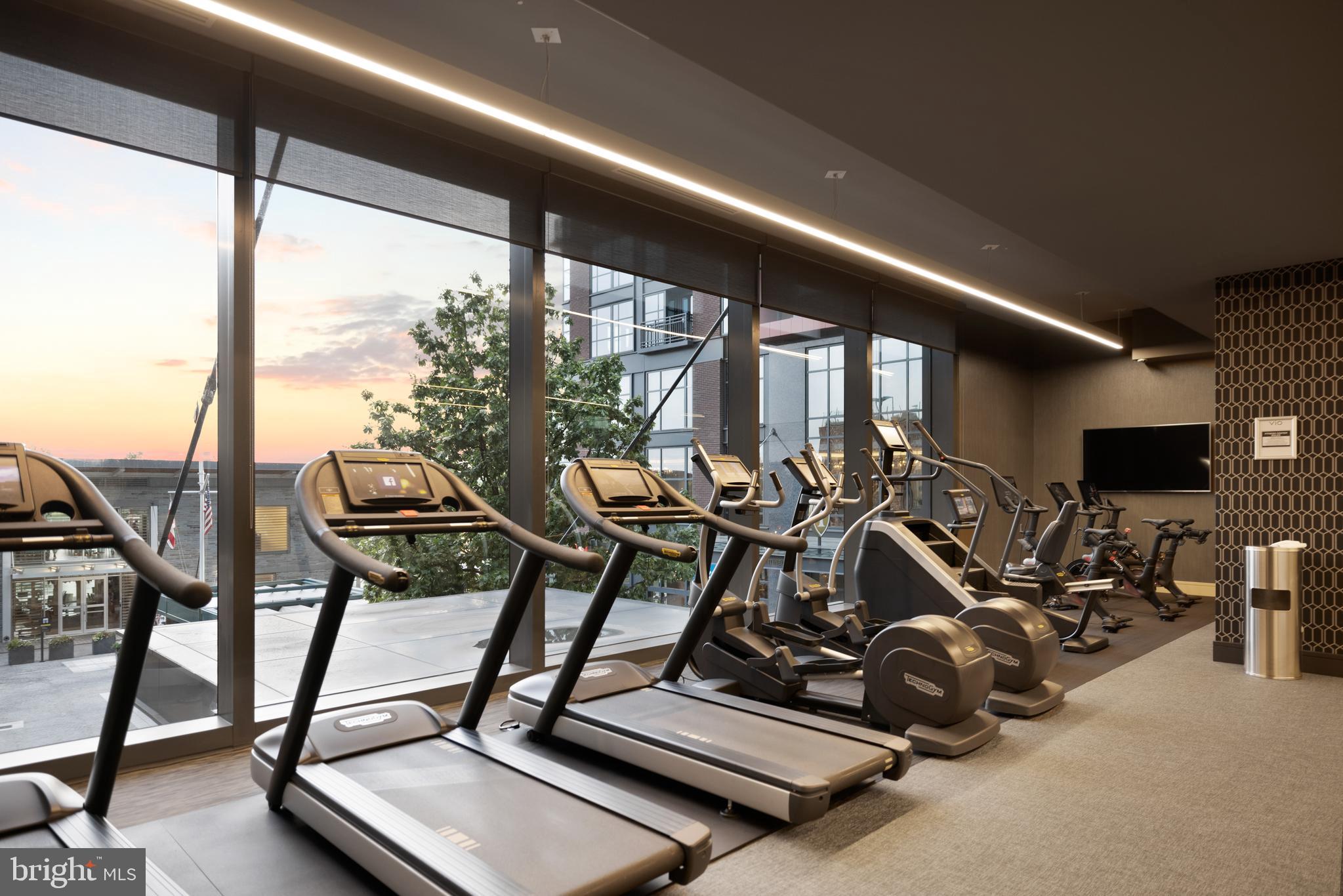 45 Sutton Square Southwest, Unit 503 Washington, DC 20024 - Photo 32 of 50 a view of a room with gym equipment