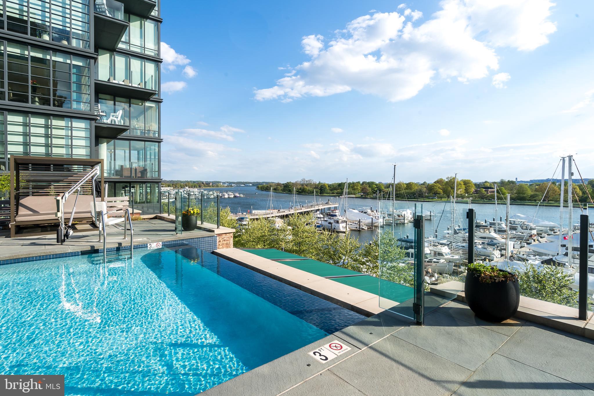 45 Sutton Square Southwest, Unit 503 Washington, DC 20024 - Photo 35 of 50 a view of a lake with a terrace