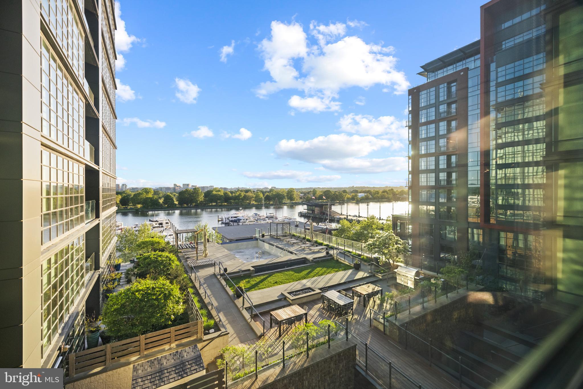 45 Sutton Square Southwest, Unit 503 Washington, DC 20024 - Photo 49 of 50 a view of a balcony with couches and pool table