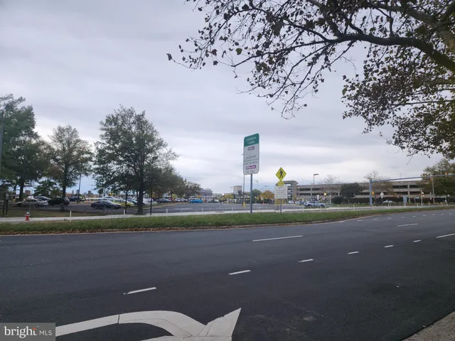 a swimming pool with outdoor seating and yard