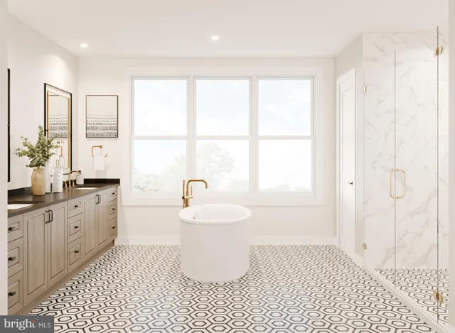 a bathroom with a double vanity sink a toilet a mirror and window