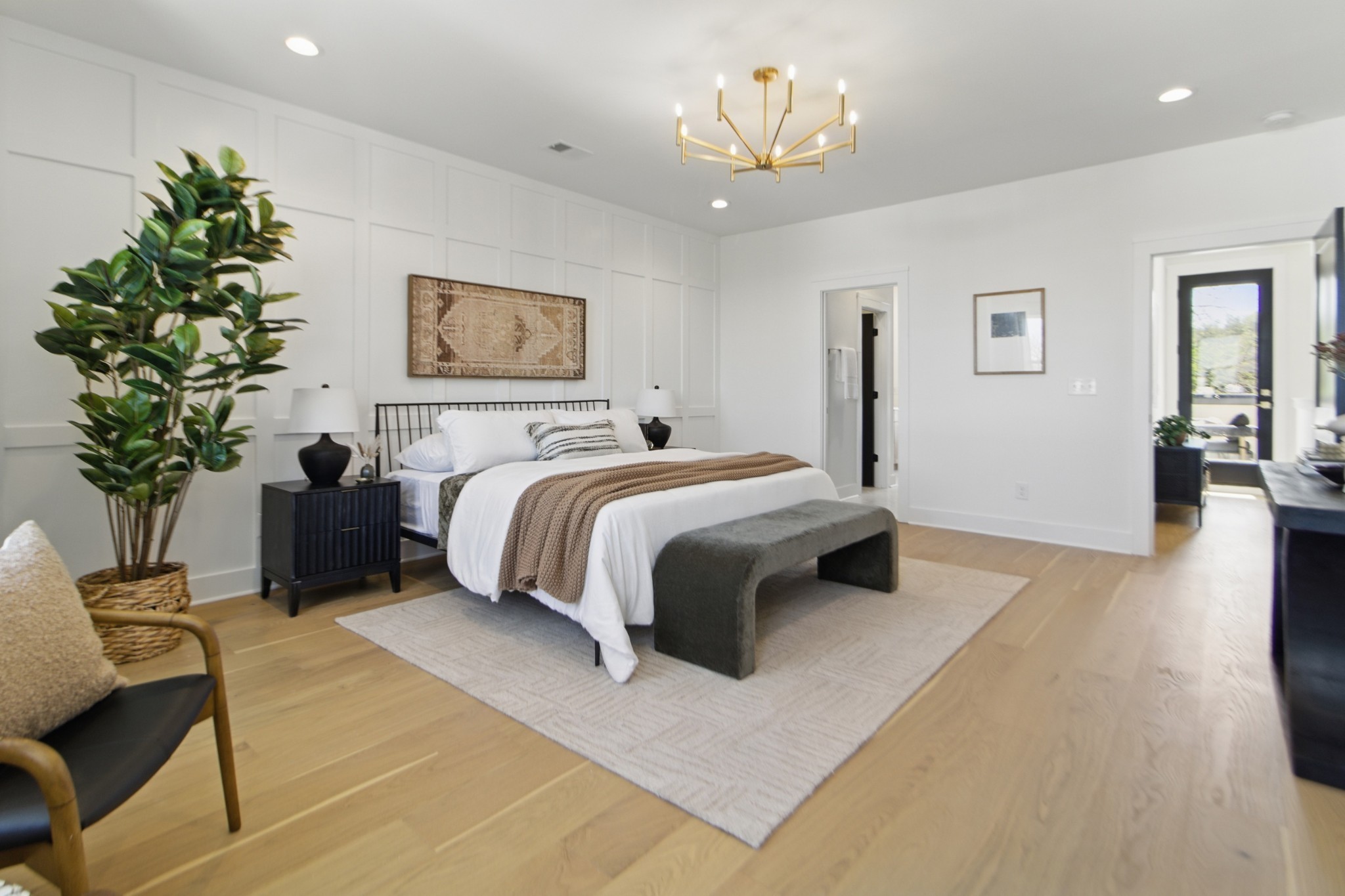 824 B Watts Lane Nashville, TN 37209 - Photo 15 of 23 a spacious bedroom with a bed and a chandelier