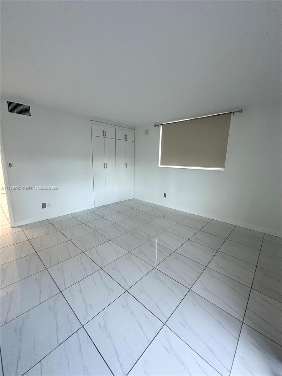 8400 Byron Avenue, Unit 2D Miami Beach, FL 33141 - Photo 15 of 21 a view of room