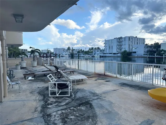 a view of a terrace with sitting area