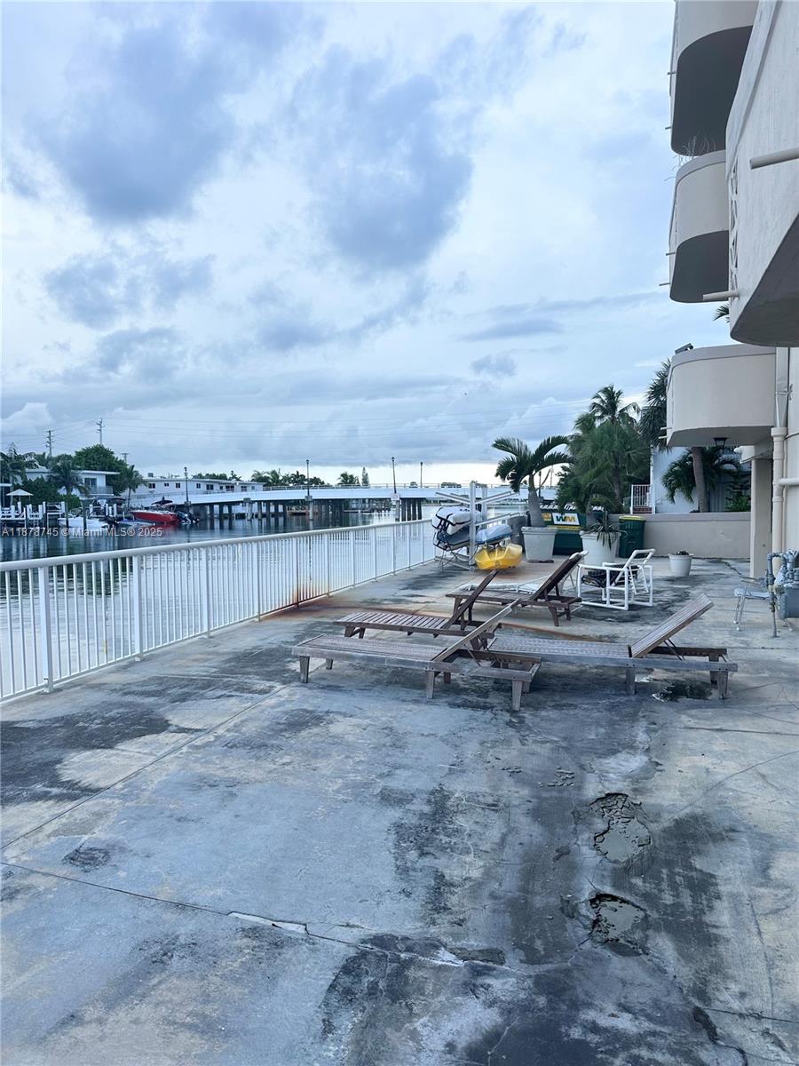 8400 Byron Avenue, Unit 2D Miami Beach, FL 33141 - Photo 20 of 21 a view of a lake with sitting space