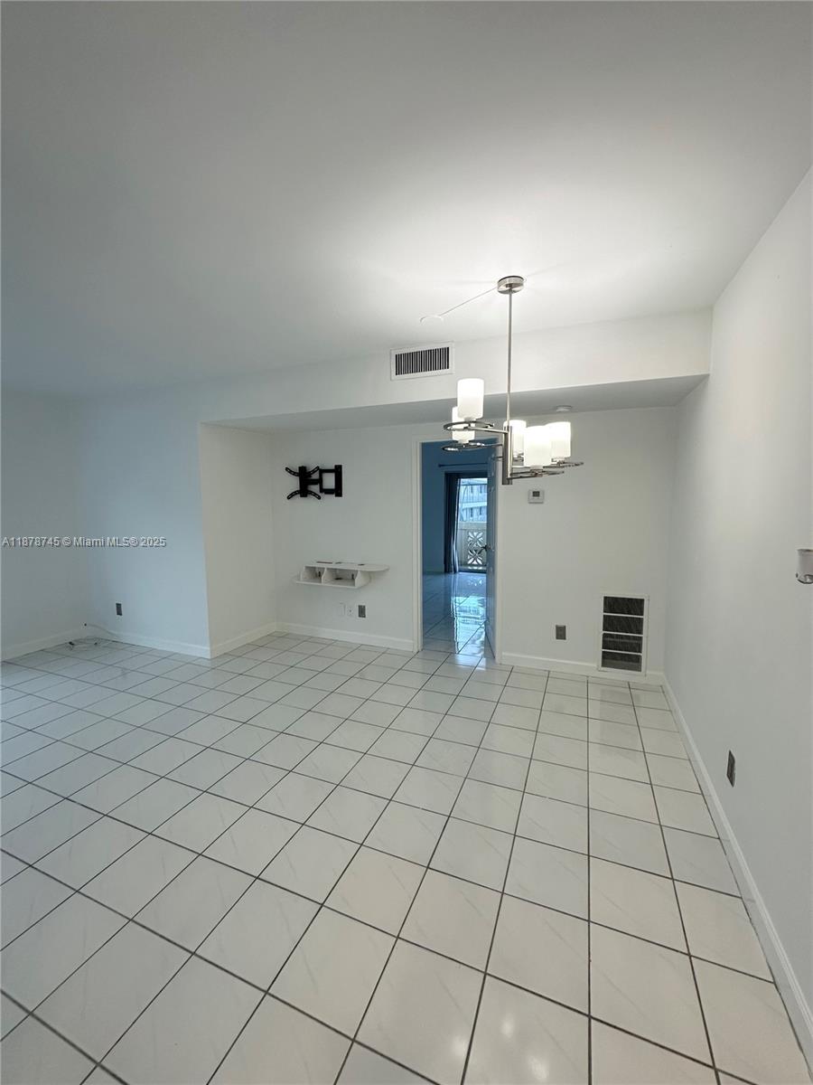 8400 Byron Avenue, Unit 2D Miami Beach, FL 33141 - Photo 4 of 21 a view of a storage & utility room