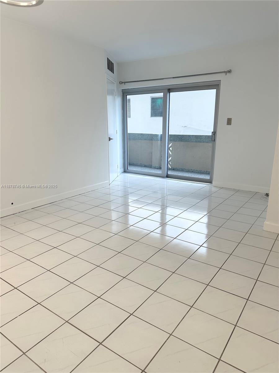 8400 Byron Avenue, Unit 2D Miami Beach, FL 33141 - Photo 5 of 21 a view of empty room