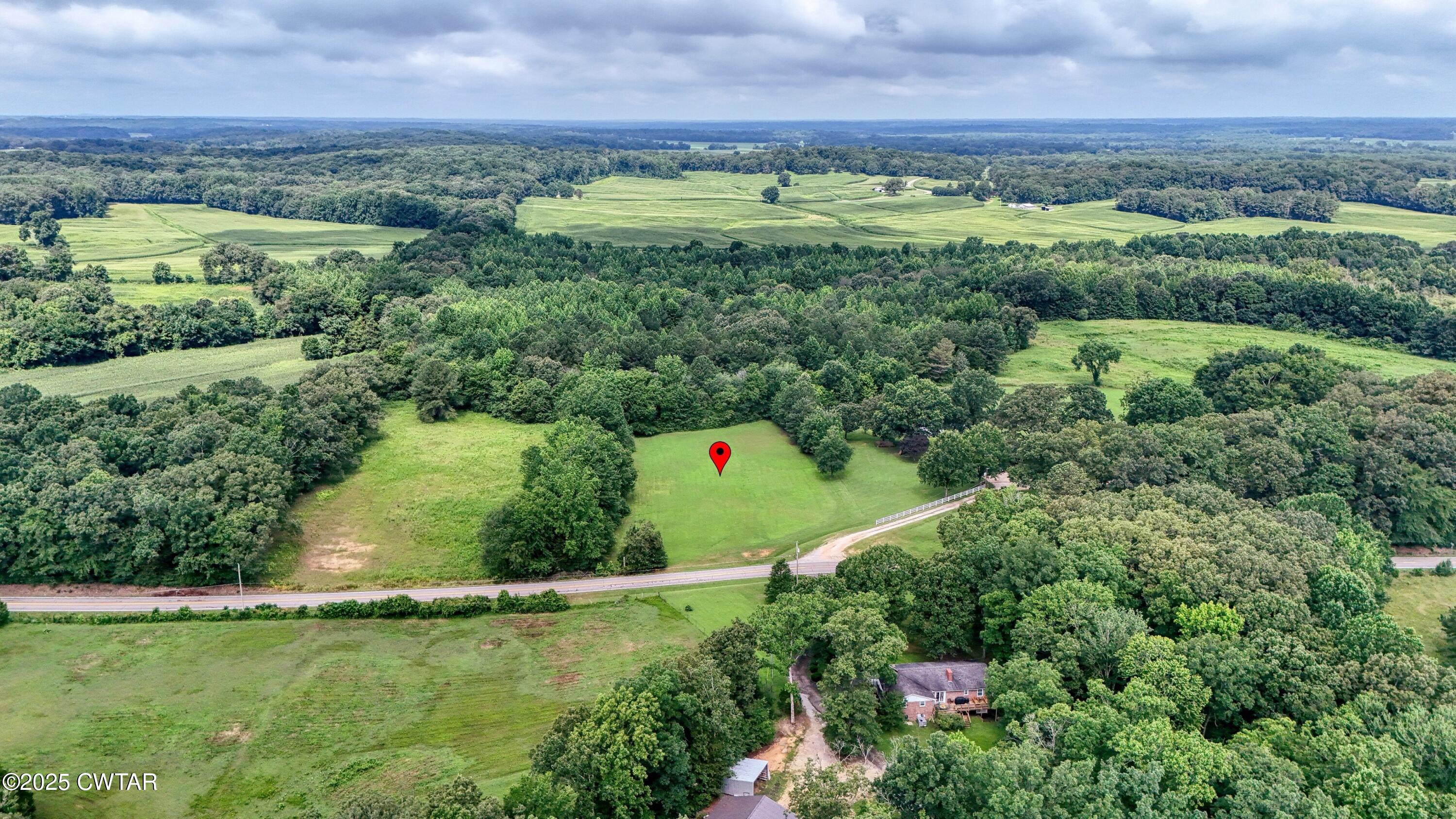 0 Highway 219 Huntingdon, TN 38344 - Photo 2 of 13 an aerial view of a golf course with a yard