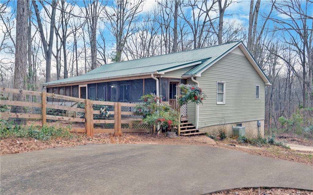 412 Winford Smith Road Athens, GA 30607 - Photo 1 of 1 a view of a house with a yard and potted plants