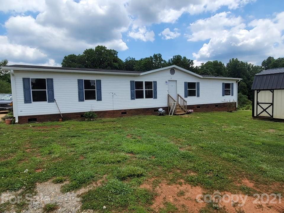 525 Baker Mill Road Cleveland, NC 27013 - Photo 1 of 35 a house view with a garden space