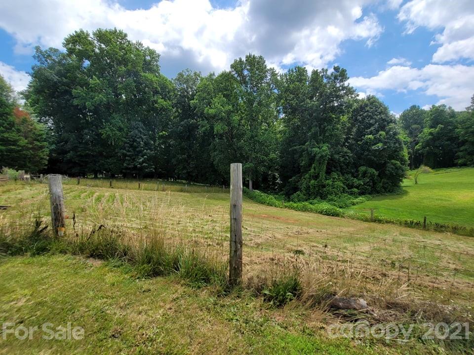 525 Baker Mill Road Cleveland, NC 27013 - Photo 14 of 35 a view of a garden with a slide