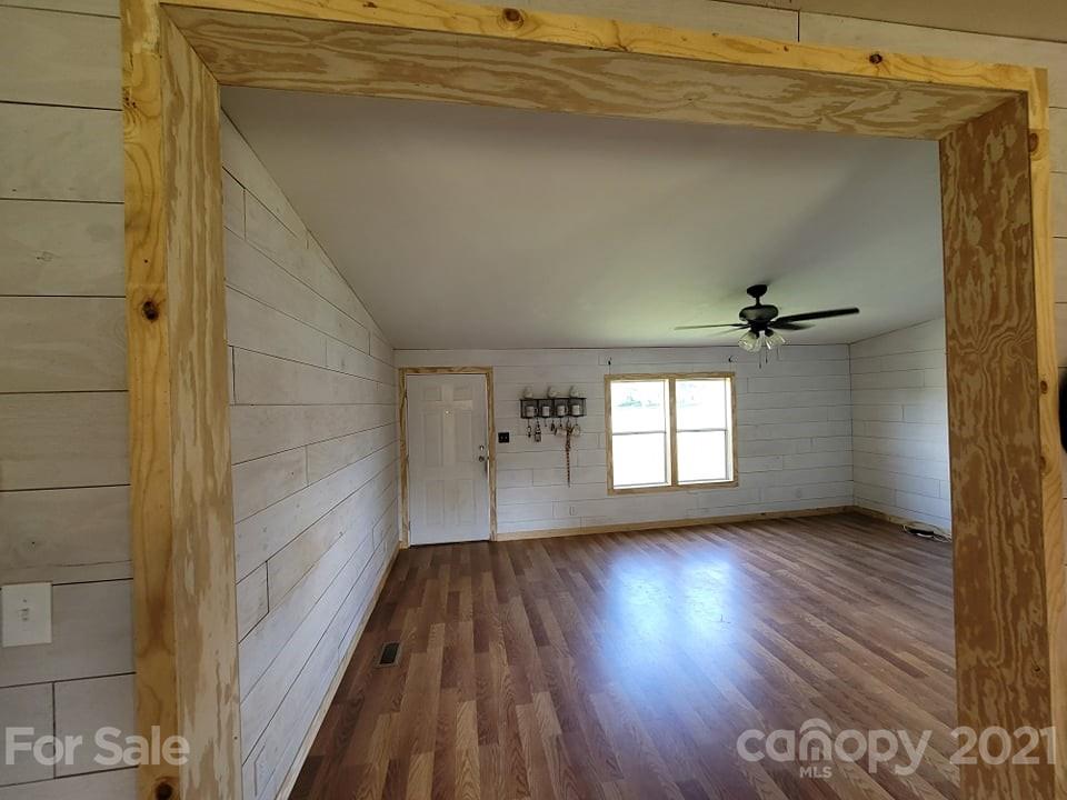 525 Baker Mill Road Cleveland, NC 27013 - Photo 16 of 35 a view of a room with wooden floors and window