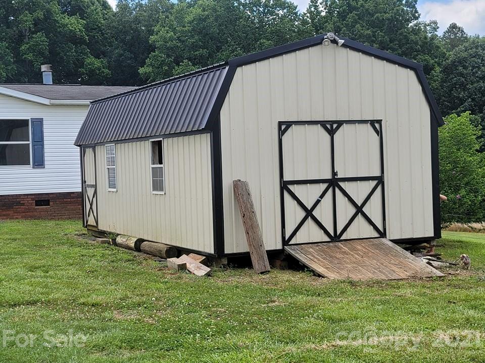 525 Baker Mill Road Cleveland, NC 27013 - Photo 3 of 35 a house view with a garden space