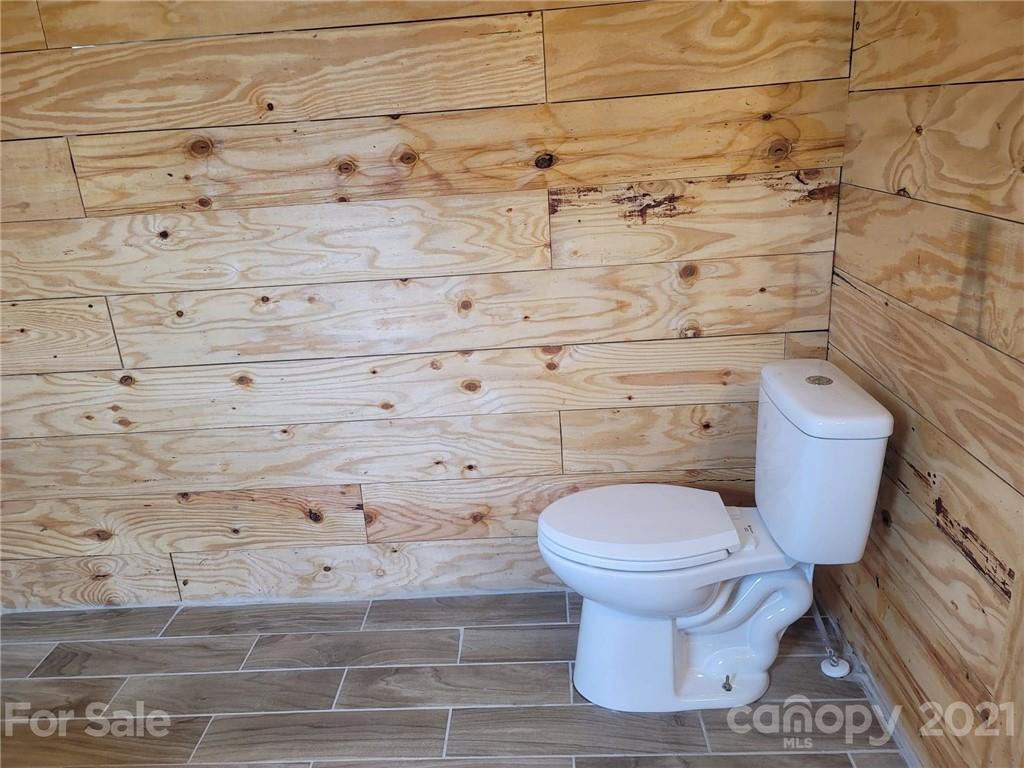 525 Baker Mill Road Cleveland, NC 27013 - Photo 29 of 35 a bathroom with a toilet and a sink