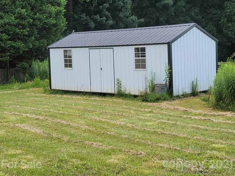 525 Baker Mill Road Cleveland, NC 27013 - Photo 4 of 35 a view of a backyard