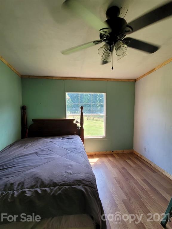525 Baker Mill Road Cleveland, NC 27013 - Photo 35 of 35 a bedroom with a bed and a window