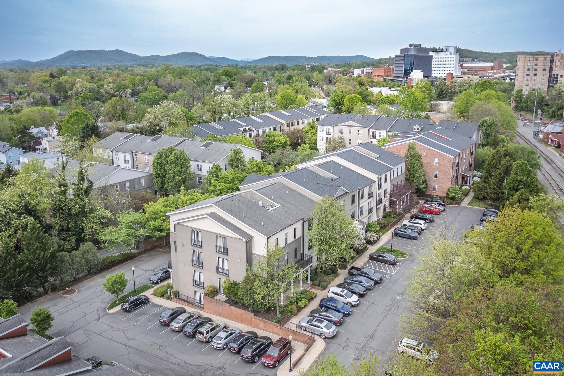 720 Walker Square, Unit 3D Charlottesville, VA 22903 - Photo 23 of 26 an aerial view of residential houses with outdoor space and trees