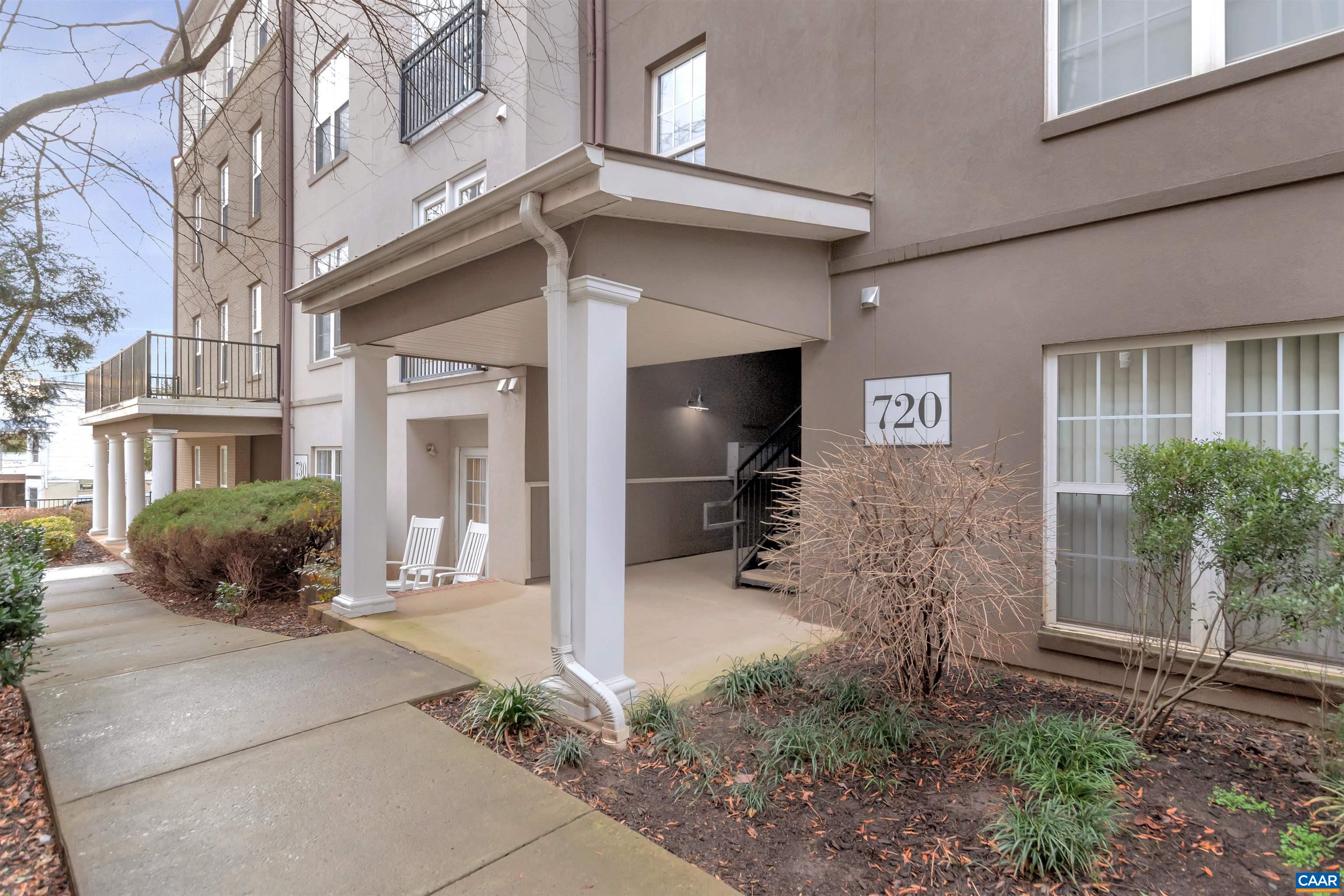 720 Walker Square, Unit 3D Charlottesville, VA 22903 - Photo 4 of 26 a front view of a house with a yard