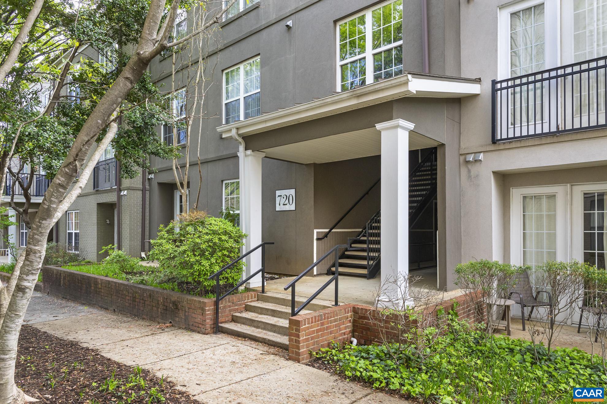 720 Walker Square, Unit 3D Charlottesville, VA 22903 - Photo 5 of 26 a front view of a house with a garden