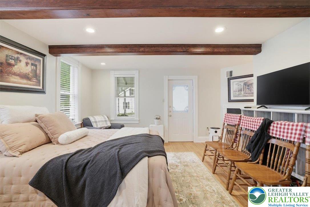 3585 Fairyland Road Lehighton, PA 18235 - Photo 37 of 57 a bedroom with a bed and a flat screen tv