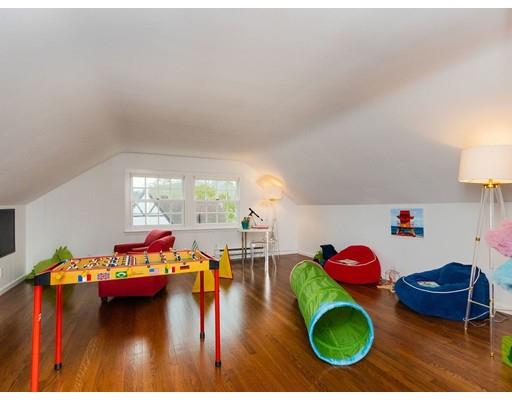 15 Kingswood Road Newton, MA 02466 - Photo 18 of 25 a living room with furniture and a floor to ceiling window