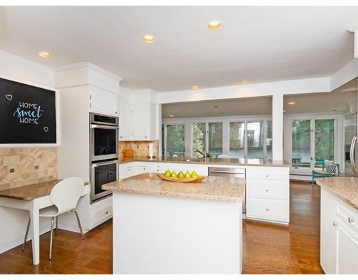 15 Kingswood Road Newton, MA 02466 - Photo 8 of 25 a kitchen with a table and chairs in it