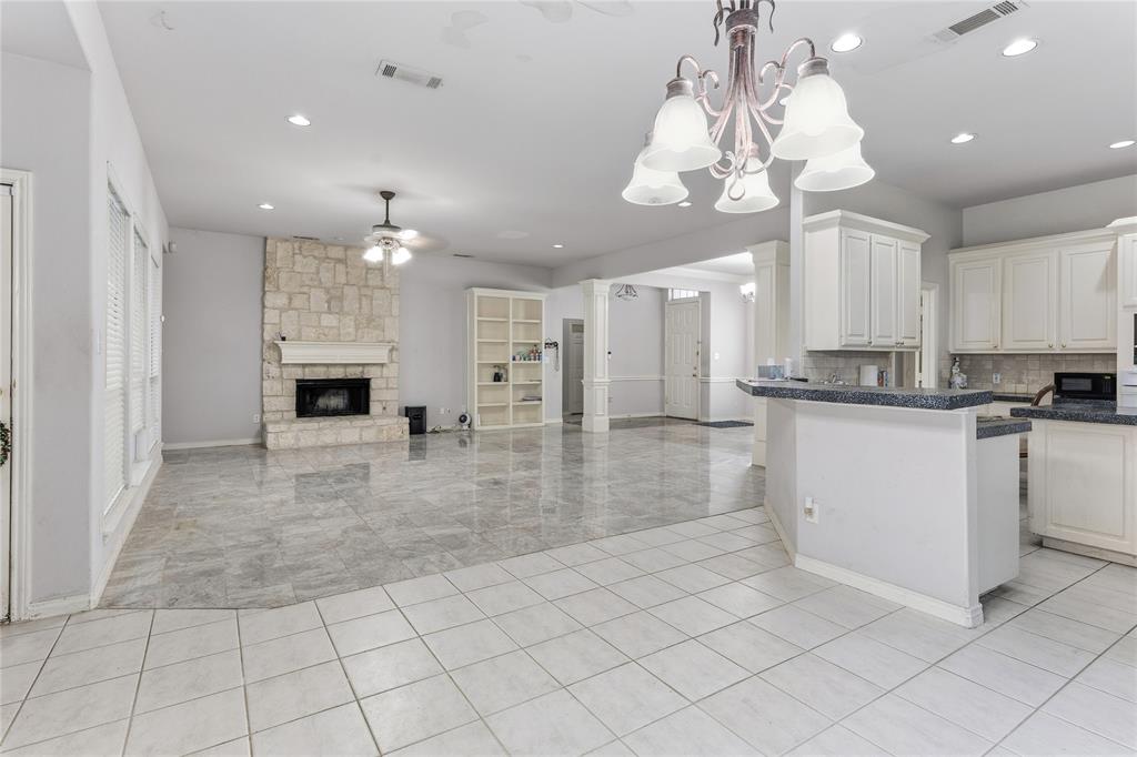 2505 Timber Ridge Drive Garland, TX 75044 - Photo 15 of 38 a view of kitchen with sink and refrigerator
