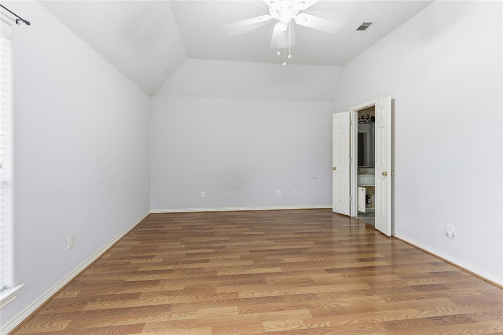 2505 Timber Ridge Drive Garland, TX 75044 - Photo 19 of 38 wooden floor in an empty room