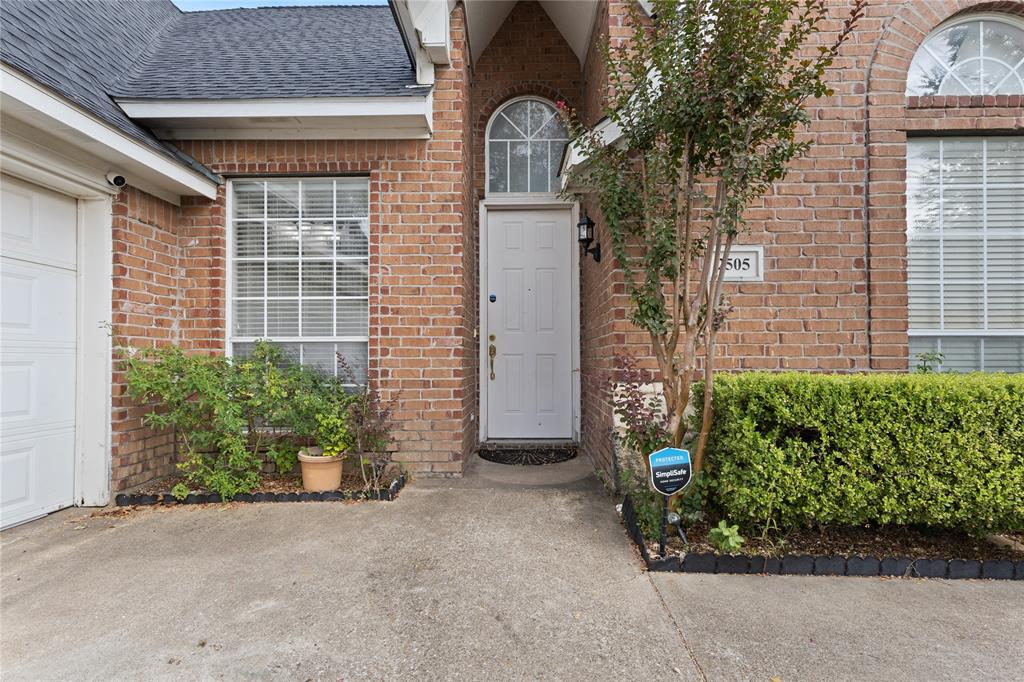 2505 Timber Ridge Drive Garland, TX 75044 - Photo 3 of 38 a front view of a house with garden