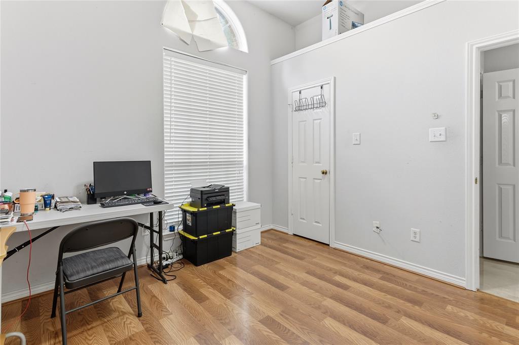 2505 Timber Ridge Drive Garland, TX 75044 - Photo 33 of 38 a bedroom with a workspace