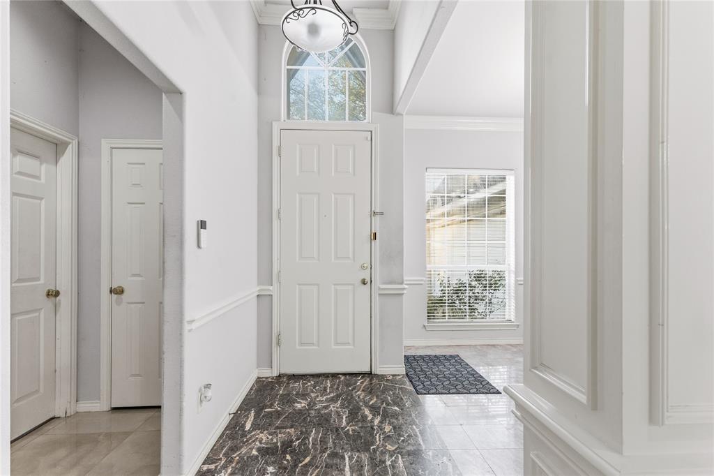 2505 Timber Ridge Drive Garland, TX 75044 - Photo 4 of 38 a view of room with window and hardwood floor