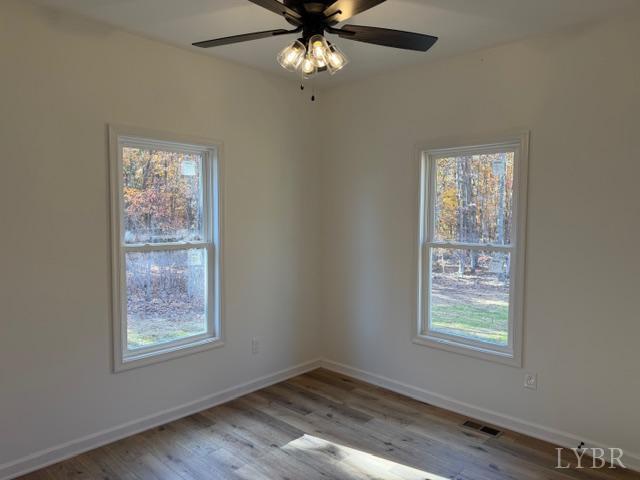 689 Robinson Road Appomattox, VA 24522 - Photo 11 of 16 a view of an empty room with a window