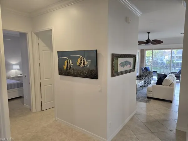 a view of a livingroom with furniture and windows