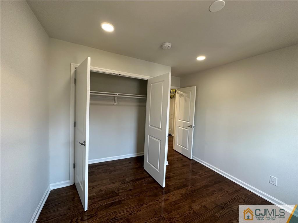 4102 Hana Road Edison, NJ 08817 - Photo 26 of 40 a view of an empty room with wooden floor
